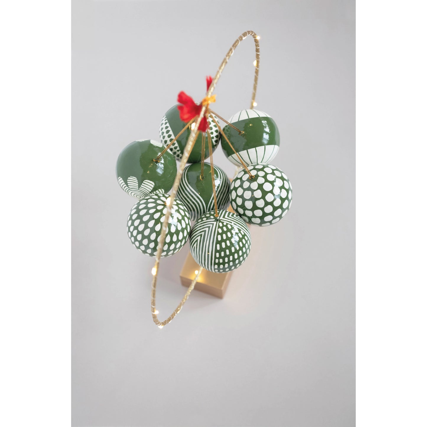 Round Hand-Painted Paper Mache Ball Ornament - Green and White